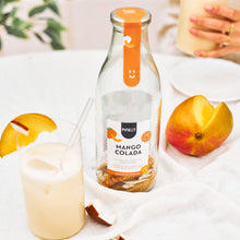Zelf tropische Mangocolada cocktails maken voor zonnige momenten en zomerborrels thuis.